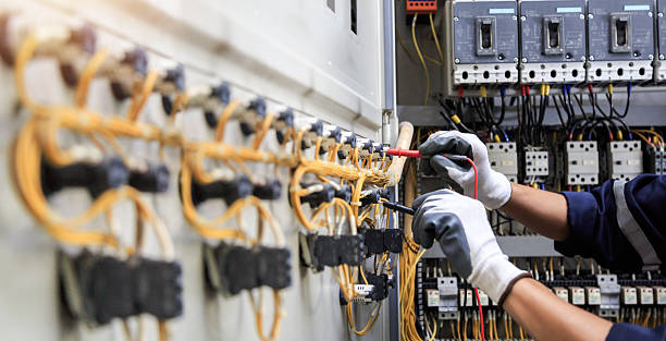 Professional Electrician technician working in Meridian Village, CO